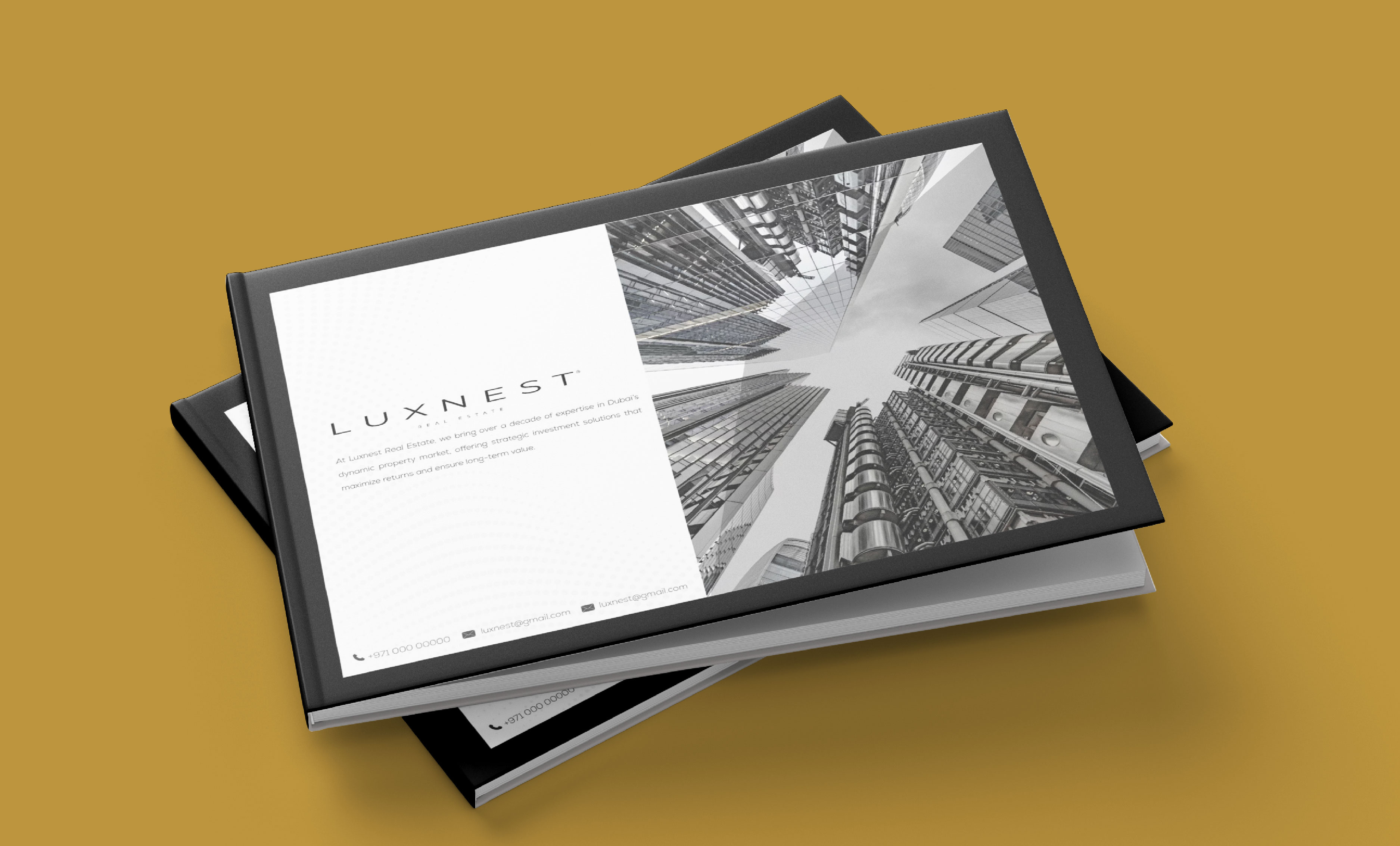 Landscape hardcover company profile for Luxnest Real Estate, opened to the introduction page beside black and white Dubai skyline photography, designed by 360Kreations